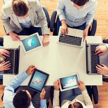 Business Team With Laptop And Tablet Pc PDHGRFS